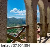 Arched gallery along the facade of the house in the ancient mountain village of Chokh in Dagestan. Стоковое фото, фотограф Евгений Харитонов / Фотобанк Лори