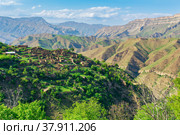 Ruins of houses on a mountainside in Kurib, a depopulated village with the only remaining household with an apiary, Dagestan. Стоковое фото, фотограф Евгений Харитонов / Фотобанк Лори