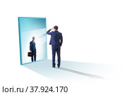 Young businessman in alter ego concept. Стоковое фото, фотограф Elnur / Фотобанк Лори
