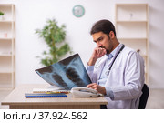 Young male doctor radiologist working in the clinic. Стоковое фото, фотограф Elnur / Фотобанк Лори