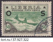 Местные жители в каноэ, надпечатка OS. Почтовая марка Либерии 1920 года. Редакционная иллюстрация, иллюстратор александр афанасьев / Фотобанк Лори