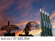 Air defense radars of military mobile anti aircraft systems and modern Russian anti-aircraft missiles OSA-AKM on the background of the sunset orange sky,Russia. Стоковое фото, фотограф Владимир Журавлев / Фотобанк Лори