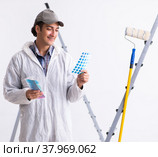 Painter working at construction site. Стоковое фото, фотограф Elnur / Фотобанк Лори