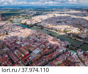Aerial view Sevilla of city center with embankment of Guadalquivir. Стоковое фото, фотограф Яков Филимонов / Фотобанк Лори