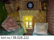 Интерьер спальной комнаты в деревенском доме. Стоковое фото, фотограф Анна Аникова / Фотобанк Лори