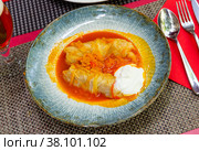 Golubtsy (cabbage rolls) served on table. Стоковое фото, фотограф Яков Филимонов / Фотобанк Лори