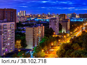 Night street in lights with blue sky and yellow road. Стоковое фото, фотограф Галина Царькова / Фотобанк Лори