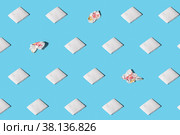 Trendy pattern from clean and used napkins. Concept of exclusiveness, uniqueness. Paper towels with soft shadow. Isometric pattern on blue background. Стоковое фото, фотограф Эдуард Слободянюк / Фотобанк Лори