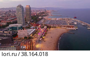 Drone view of the evening Barcelona, the capital of Catalonia, on the Mediterranean coast, Spain. Стоковое видео, видеограф Яков Филимонов / Фотобанк Лори