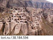 Vardzia cave monastery structures carved into mountain. Стоковое фото, фотограф Яков Филимонов / Фотобанк Лори
