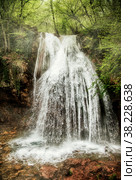 Jur-Jur waterfall in South-Eastern Crimean Peninsula. Morning landscape. Attraction in vicinity of Alushta, Ulu-Uzen river at an altitude 468 meters above sea level. Amazing tourism in Russia. Стоковое фото, фотограф Aleksandr Golubev / Фотобанк Лори