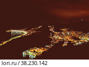 Illustration. Night view of the city of Rio de Janeiro from Sugarloaf mountain at sunset, Brazil. Стоковая иллюстрация, иллюстратор Aleksandr Golubev / Фотобанк Лори