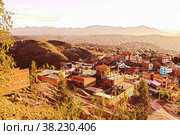 Beautiful views of the city and mountains of Central Bolivia at an altitude of 4000 meters, in South America. Стоковая иллюстрация, иллюстратор Aleksandr Golubev / Фотобанк Лори