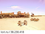 Old train in the train cemetery Cementerio De Los Trenes, Uyuni, Bolivia. Стоковая иллюстрация, иллюстратор Aleksandr Golubev / Фотобанк Лори