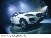 ST. PETERSBURG, RUSSIA-APRIL 13, 2018: Jaguar E-Pace at presentation in chic space for famous public. Jaguar E-Pace is first SUV of famous British sports brand Jaguar. Luxury auto for business people. Редакционное фото, фотограф Aleksandr Golubev / Фотобанк Лори