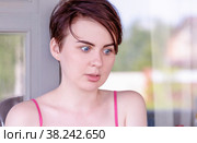 Portrait of a girl looking down in fear. Стоковое фото, фотограф Татьяна Дворецкая / Фотобанк Лори