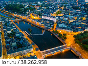 Evening aerial view of Laval with buildings, river Mayenne and old bridge. Стоковое фото, фотограф Яков Филимонов / Фотобанк Лори