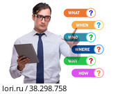 Concept of many different questions asked with businessman. Стоковое фото, фотограф Elnur / Фотобанк Лори