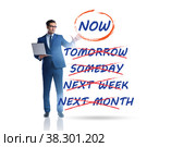 Concept of procrastination with now or later. Стоковое фото, фотограф Elnur / Фотобанк Лори