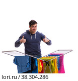 Husband man doing laundry isolated on white. Стоковое фото, фотограф Elnur / Фотобанк Лори