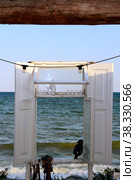 A window on the seashore as a decor and photo zone. Photo. Стоковое фото, фотограф Ирина Кротова / Фотобанк Лори