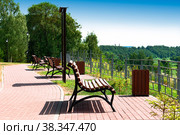 City park with benches on the embankment. Europe, Russia, Rzhev. (2021 год). Стоковое фото, фотограф Алексей Сорокин / Фотобанк Лори