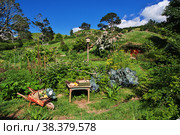 Hobbiton, New Zealand - 15 Dec 2018. Hobbiton is theme Park in New Zealand. Редакционное фото, фотограф Сергей Стрелков / Фотобанк Лори