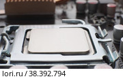 Macro view of the CPU on a computer motherboard. Camera  move. Стоковое видео, видеограф Mixail59 / Фотобанк Лори