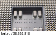 Gold plated pins of the old model CPU socket on a computer motherboard. Macro. Camera  move. Стоковое видео, видеограф Mixail59 / Фотобанк Лори