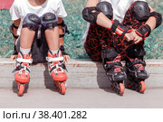 Small children's legs with roller skates. Стоковое фото, фотограф Акиньшин Владимир / Фотобанк Лори