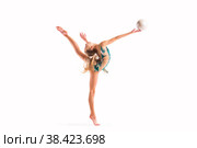 Gymnast girl in an emerald swimsuit performs an exercise with a ball isolated on white background. Стоковое фото, фотограф Мария Мороз / Фотобанк Лори