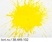 Image of yellow paint spots spilled on background of white paper. Стоковое фото, фотограф Яков Филимонов / Фотобанк Лори