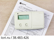 Акт допуска в эксплуатацию проверки, замены, демонтажа прибора учёта электрической энергии (измерительного комплекса) и устройство считывания счетчиков энергомера се 901. Редакционное фото, фотограф Андрей С / Фотобанк Лори
