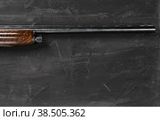 Smoothbore hunting gun on black background close up. Стоковое фото, фотограф Сергей Толмачёв / Фотобанк Лори