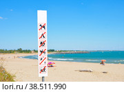 Warning on the beach that is forbidden. Стоковое фото, фотограф Irina Kuchugurina/Gaudy / Фотобанк Лори