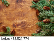Wooden background with pine branches. New Year. Christmas. Rustic. Top view. Стоковое фото, фотограф Лютик Фалисова / Фотобанк Лори