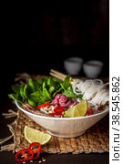 Vietnamese Beef Noodle Soup Pho Bo. Стоковое фото, фотограф Татьяна Ворона / Фотобанк Лори