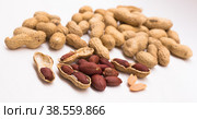 peanut kernels on a white background. Стоковое фото, фотограф Татьяна Яцевич / Фотобанк Лори