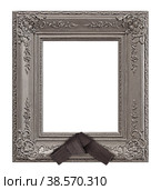 Silver frame with black mourning ribbon for paintings, mirrors or photo isolated on white background. Стоковое фото, фотограф Елена  Попкова / Фотобанк Лори