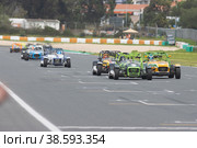 11-20-2022 PORTUGAL, LISBON: Caterham festival - colorful racing karts driving on the track. Редакционное фото, фотограф Константин Шишкин / Фотобанк Лори