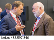 Russia. Saint-Petersburg. XXIII St. Petersburg International Economic Forum 2019. SPIEF 2019 participants. Evgeny Kovnir, CEO of ANO Digital Economy, and Viktor Vekselberg, Chairman of the Board of Directors of Renova. Россия. Санкт-Петербург. XXIII Петербургский международный экономический форум 2019. Участники ПМЭФ-2019. Генеральный директор АНО Цифровая экономика Евгений Ковнир и председатель совета директоров компании Ренова Виктор Вексельберг. Редакционное фото, фотограф Алексей Смышляев / Фотобанк Лори