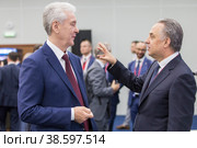 Russia. Saint-Petersburg. XXIII St. Petersburg International Economic Forum 2019. SPIEF 2019 participants. Moscow Mayor Sergei Sobyanin and Deputy Prime Minister of the Russian Federation Vitaly Mutko. Россия. Санкт-Петербург. XXIII Петербургский международный экономический форум 2019. Участники ПМЭФ-2019. Мэр Москвы Сергей Собянин и заместитель председателя правительства Российской Федерации Виталий Мутко. Редакционное фото, фотограф Алексей Смышляев / Фотобанк Лори