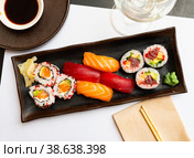Popular Japanese dish sushi combo, which includes of Uramakis, Makis and Nigiris. Стоковое фото, фотограф Яков Филимонов / Фотобанк Лори