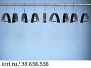 Пустой гардероб. Тремпели, вешалки без одежды. Стоковое фото, фотограф Happyphotons / Фотобанк Лори