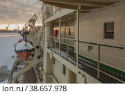 St. Petersburg, Russia January 07, 2023: The legendary icebreaker Krasin is permanently moored at the port berth on the Neva River. Museum of the World Ocean. Historic ship, conqueror of the Arctic. Редакционное фото, фотограф Владимир Ендовицкий / Фотобанк Лори