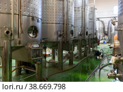 Metallic cisterns for processing and fermentating wine in shop. Стоковое фото, фотограф Яков Филимонов / Фотобанк Лори