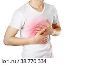 A man holds the Breasts. The pain in his chest. Heartburn. Stomach hurts. Sore point highlighted in red. Closeup. Isolated on white background. Стоковое фото, фотограф Плотников Дмитрий / Фотобанк Лори