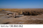 Runed Urga fishing village at the shore of Sudochye lake aka part of former Aral sea, Karakalpakstan, Uzbekistan (2017 год). Стоковое фото, фотограф Сергей Майоров / Фотобанк Лори
