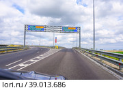 TSKAD toll road. Russian highway with signs and exits (2022 год). Редакционное фото, фотограф FotograFF / Фотобанк Лори