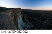 Panorama view to Aral sea from the rim of Plateau Ustyurt near Aktumsuk cape at sunset, Karakalpakstan, Uzbekistan. Стоковое фото, фотограф Сергей Майоров / Фотобанк Лори